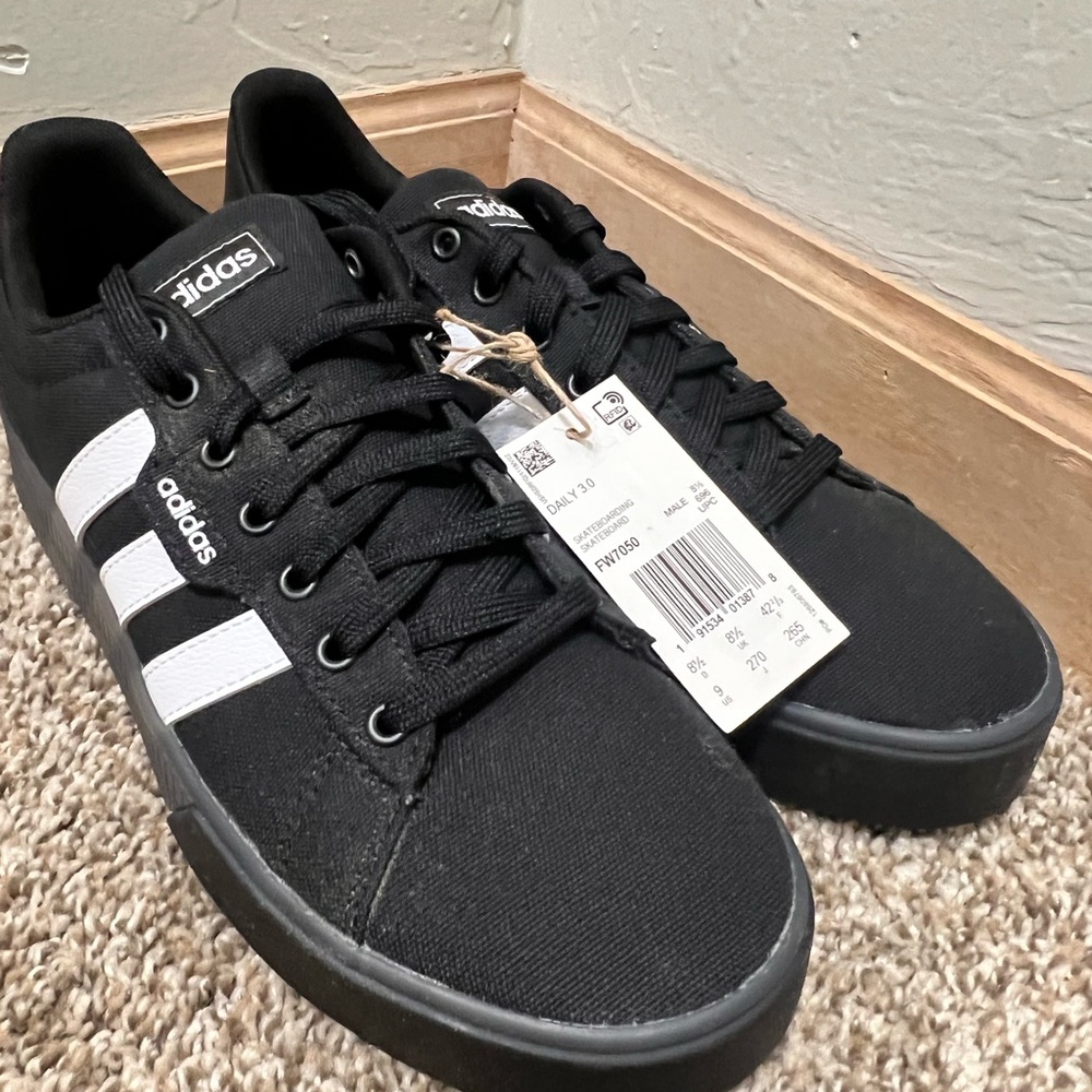 Adidas Men’s size 9 sneaker. Never worn.